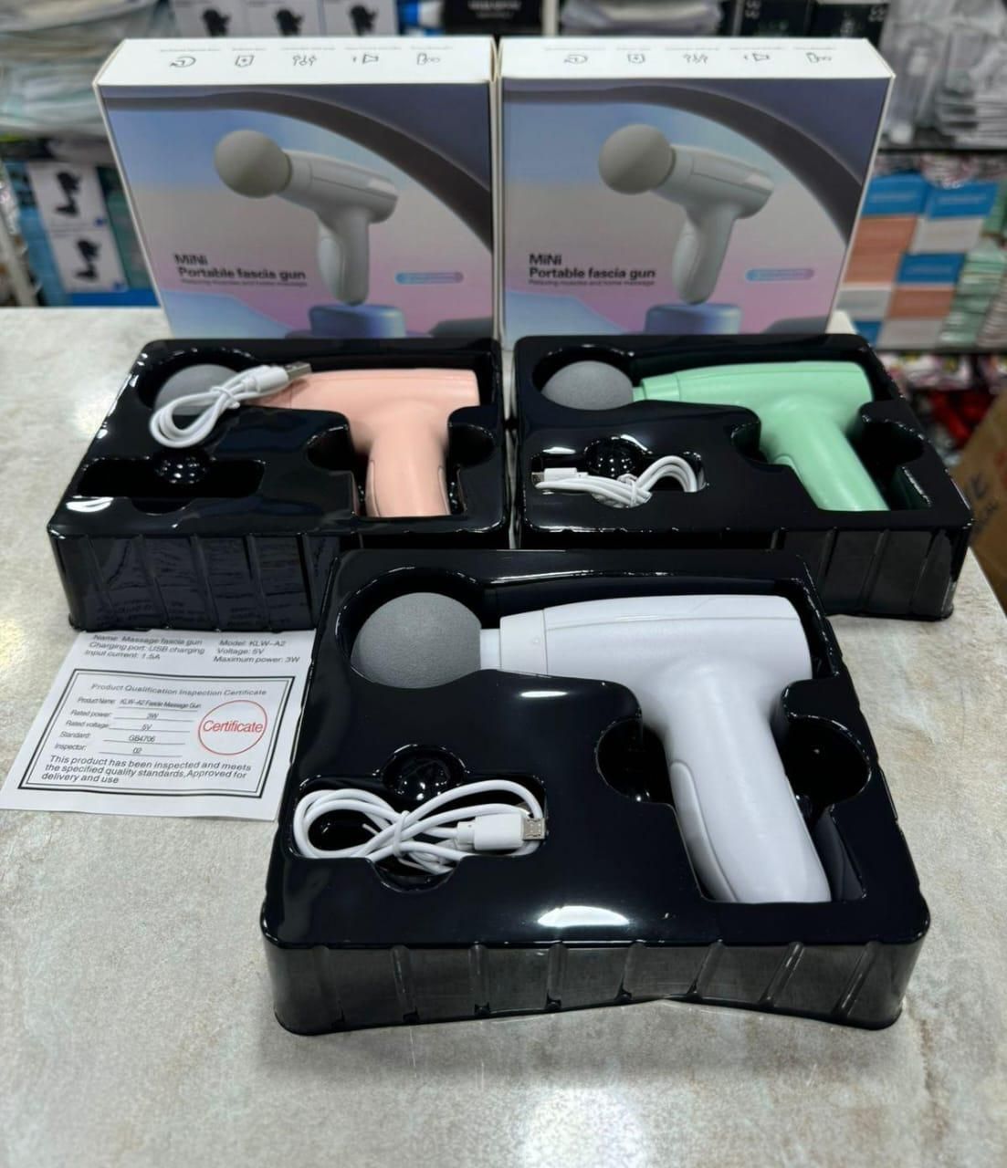 Portable Gun-Shaped Muscle Massager!